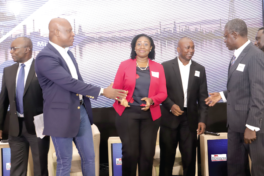 • Dr Emmanuel Kumah (right), and Prof Godfred Bokpin (2nd from right) exchanging pleasantries after the event. With them are Ato Afful (left), Managing Director, Graphic Communications Group Limited (GCGL), and Dr Priscilla Twumasi Baffour (2nd from left), Senior Lecturer, Department of Economics, University of Ghana, Legon Picture: SAMUEL TEI ADANO Graphic Business/Stanbic Bank Breakfast: Independent body needed to instill fiscal discipline — Oteng